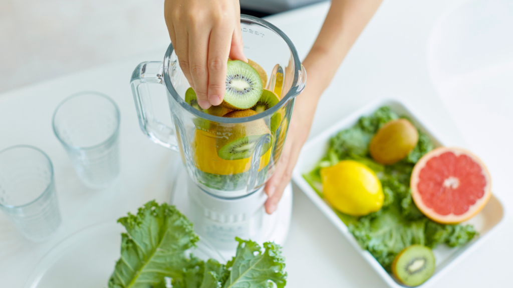 Fresh fruit and vegetables being prepared for a juice cleanse